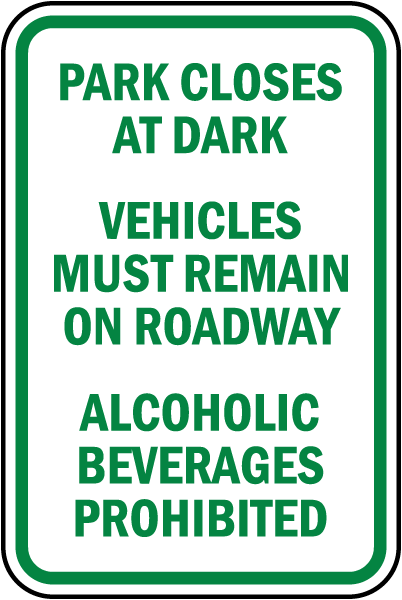 Park Closes At Dark Vehicles Must Remain On Roadway sign