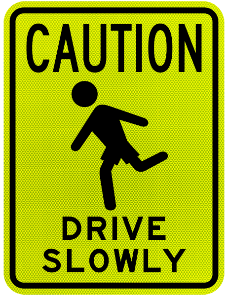 Caution Drive Slowly Sign