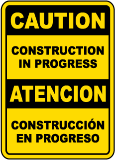 Caution Construction In Progress sign