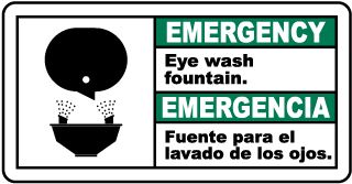Emergency Eye wash fountain - Emergencia Fuente para el lavado de los ojos bilingual sign