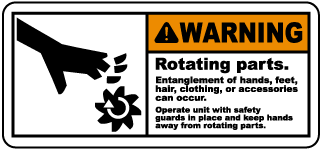 Warning Rotating parts Entanglement of hands feet hair clothing or accessories can occur.. label