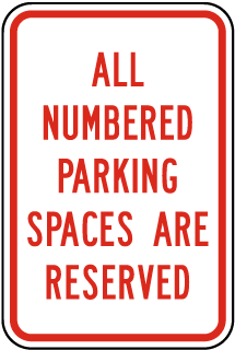 All Numbered Parking Spaces Are Reserved Sign