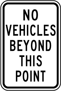 No Vehicles Beyond This Point Sign