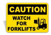 A yellow and black caution watch for forklifts sign