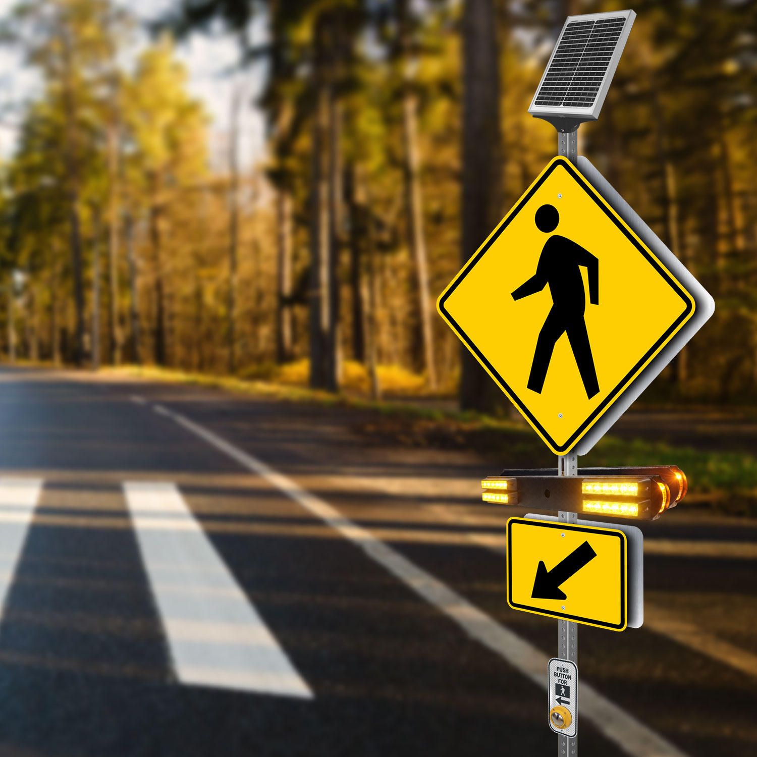 An image of a set a rectangular rapid flashing beacon sign in the evening near a cross walk