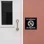 No Smoking On Premises Sign
