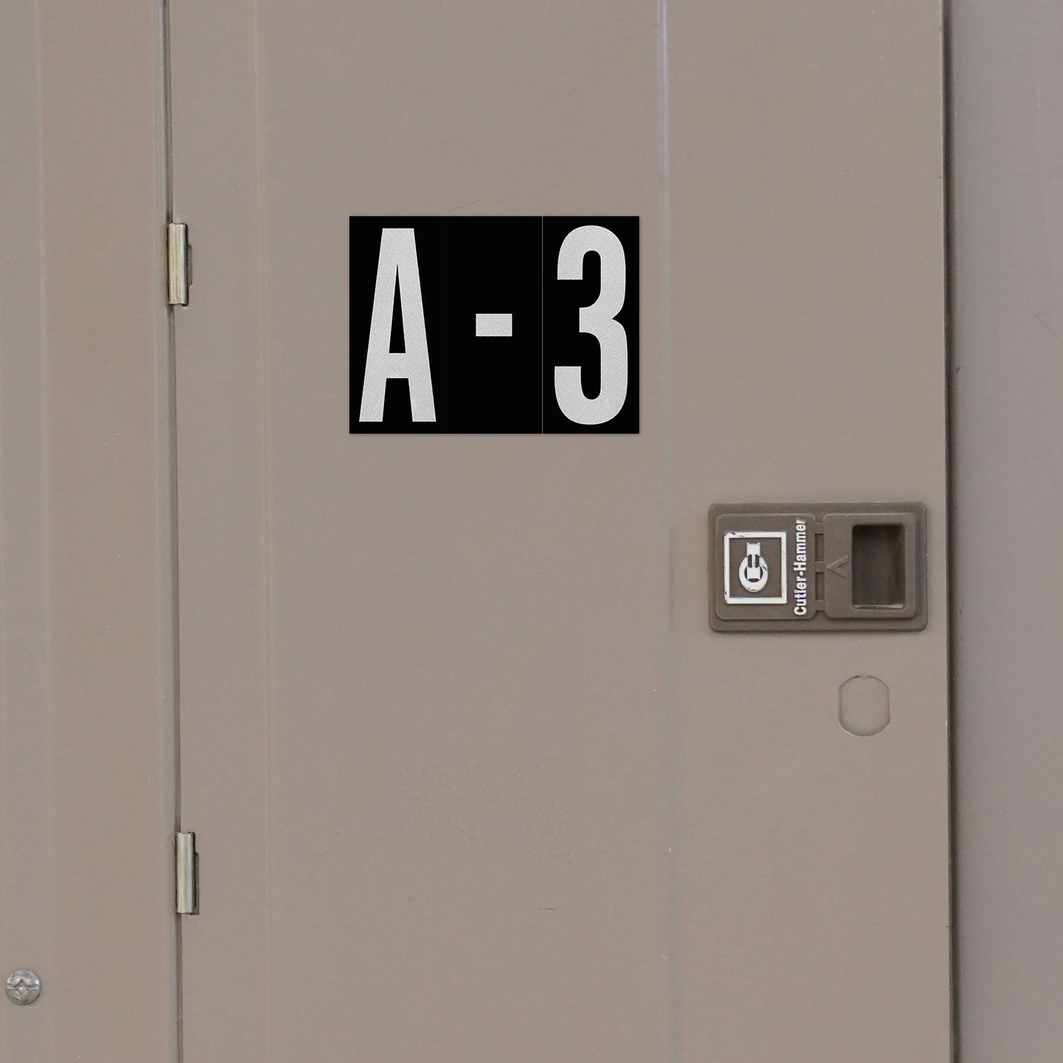 2.5" White Character on Black EG Reflective Vinyl Label