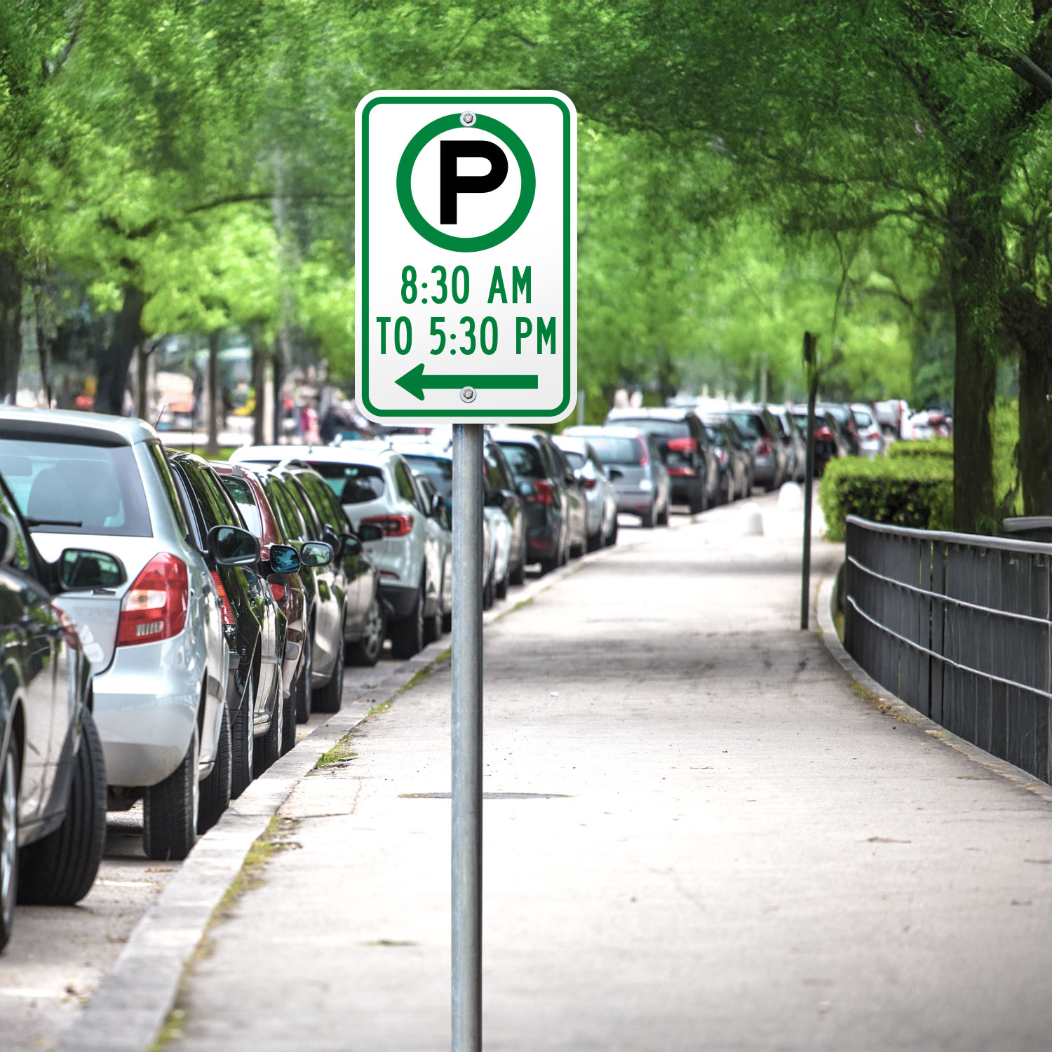 Pay Parking 8:30AM to 5:30PM to the Left Sign