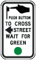 Push Button To Cross Street to the Right Wait For Green Light Sign