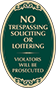 Green Background – No Trespassing Soliciting Or Loitering Oval Sign