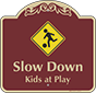 Burgundy Background – Slow Down Kids At Play Sign