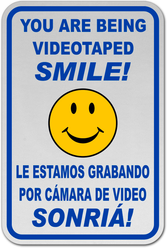 Bilingual You Are Being Videotaped Smile Sign