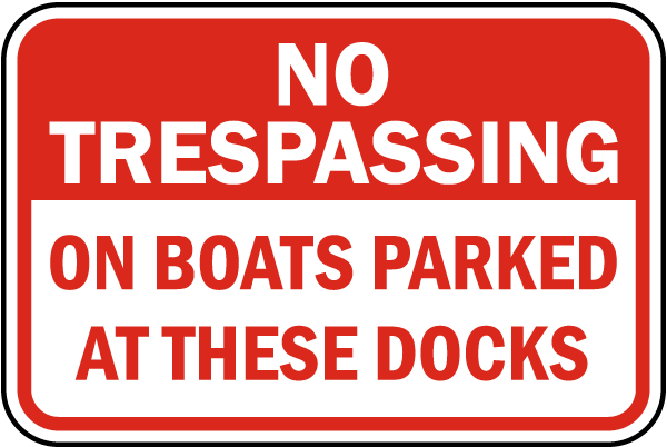 No Trespassing on Boats Parked Sign