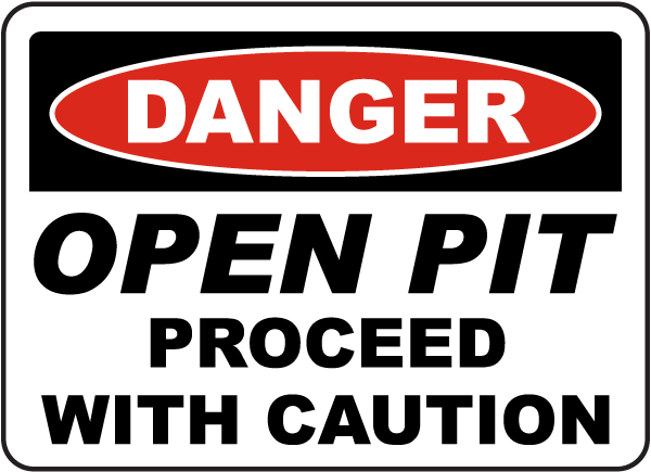 Open Pit Proceed With Caution Sign
