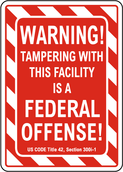 Warning Tampering Facility Is A Federal Offense Sign