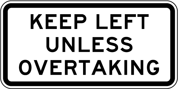 Keep Left Unless Overtaking Sign