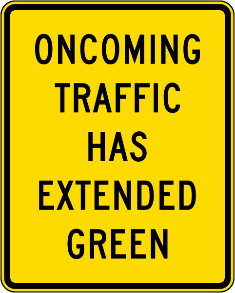 Oncoming Traffic Has Extended Green Sign