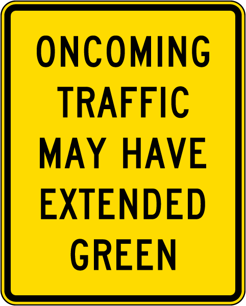 Oncoming Traffic May Have Extended Green Sign