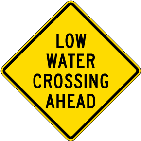 Low Water Crossing Ahead Sign