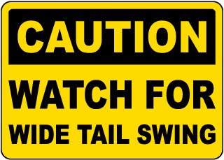 Caution Watch For Wide Tail Swing Sign