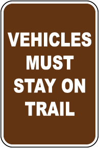Vehicles Must Stay On Trail Sign