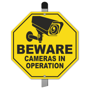 Beware Camera In Operation Sign