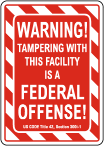 Warning Tampering Facility Is A Federal Offense Sign