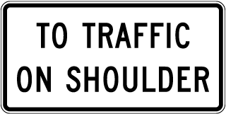 To Traffic On Shoulder Sign