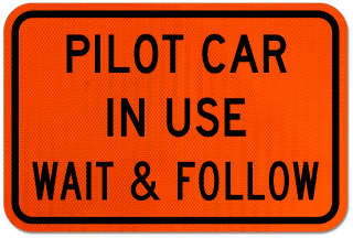 Pilot Car in Use Wait & Follow Sign
