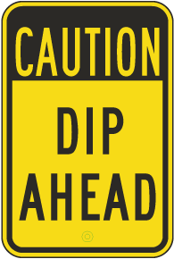 Caution Dip Ahead Sign