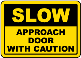 Slow Approach Door With Caution Sign
