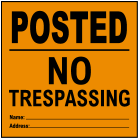Orange Posted No Trespassing Sign