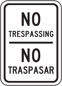 Bilingual No Trespassing Sign