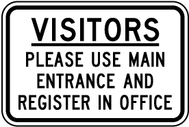 Visitors Use Main Entrance Sign