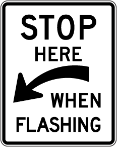 Stop Here When Flashing Sign