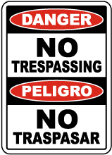 Bilingual Danger No Trespassing Sign