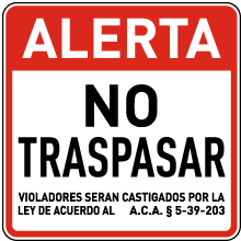 Spanish Arkansas Posted No Trespassing Sign