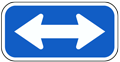 White / Blue Double Arrow Sign