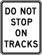 Do Not Stop on Tracks Sign