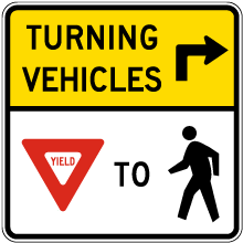 Turning Vehicles Yield To Pedestrians Sign