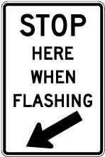 Stop Here When Flashing Sign