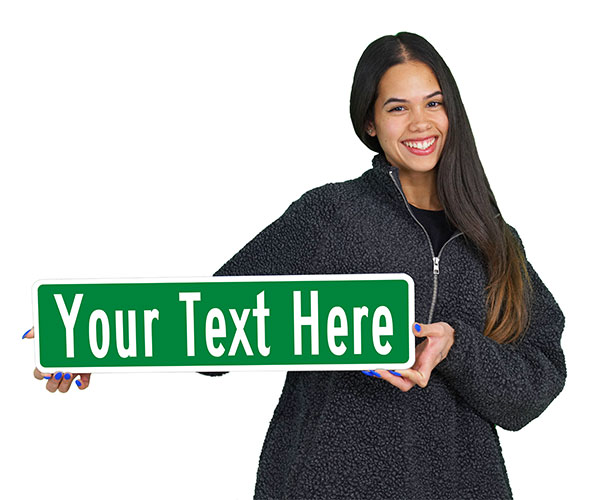 A woman holding an MUTCD Compliant Street Sign