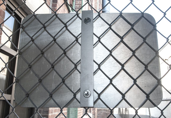 Back-view of the chain-link fence brackets