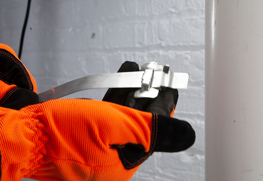 Strapping being inserted into the buckle